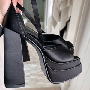 Black satin platform heels! New without tags.